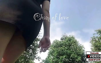 Thai Beauty with Elegant Curves Bathing in Nature s Embrace